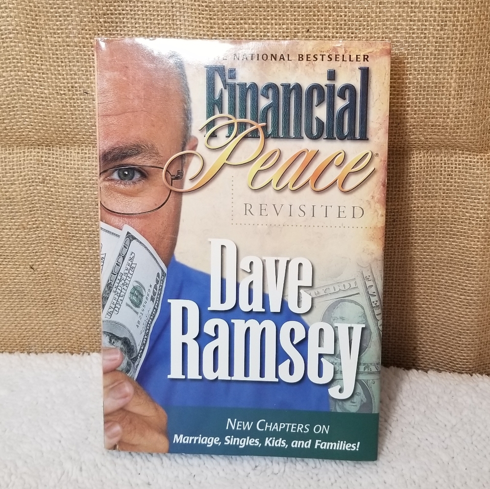 Dave Ramsey Financial Peace Hard Back book and cash flow planning dvd.